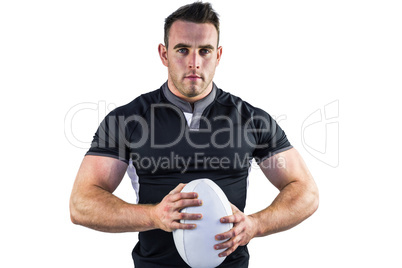 Tough rugby player looking at camera