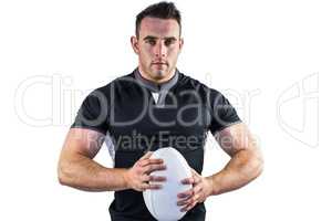 Tough rugby player looking at camera