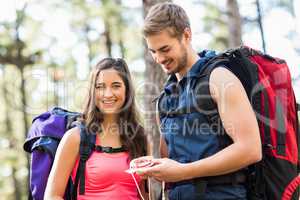 Young happy joggers looking at camera