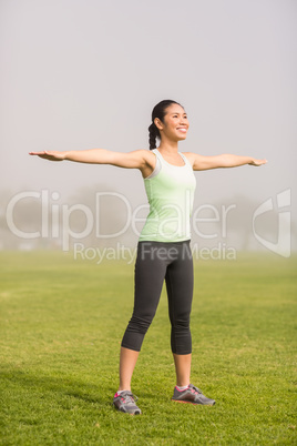 Smiling sporty woman working out