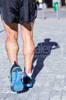 Close up view of athletes legs running