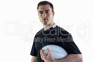 Rugby player holding a rugby ball