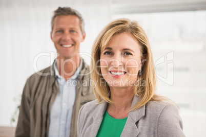 Casual business colleagues smiling at camera