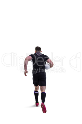 Rugby player running with the ball