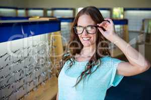 Pretty woman shopping for new glasses