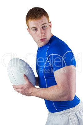 Rugby player running with the rugby ball