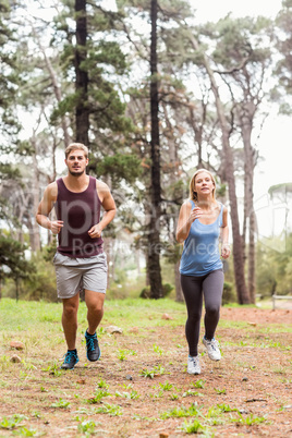 Young happy joggers running