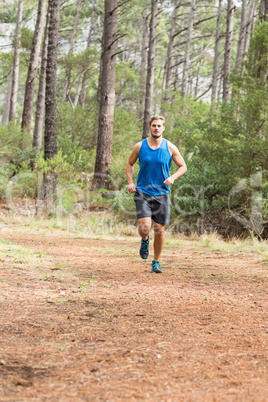 Young happy jogger running