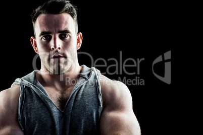 Handsome bodybuilder with arms crossed