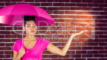 A beautiful woman holding an umbrella