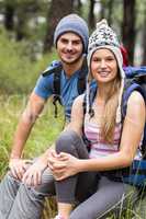 Portrait of a young smiling hiker couple