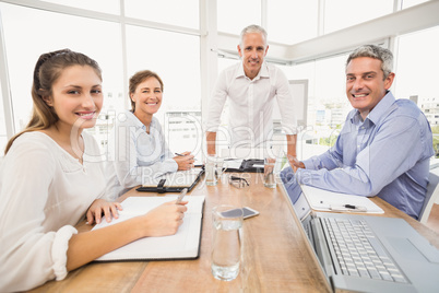 Smiling business people during a presentation