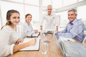 Smiling business people during a presentation