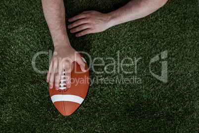 American football player scoring a touchdown