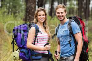 Portrait of a young happy hikers couple