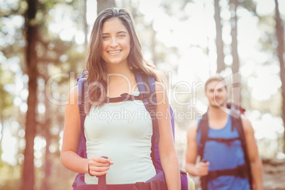 Young happy joggers looking at camera