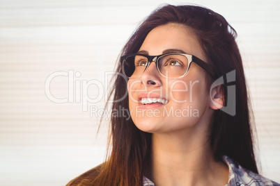 Pretty hipster looking up and smiling