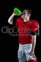 American football player drinking