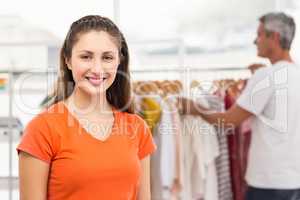 Smiling casual businesswoman volunteering