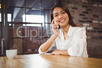 Casual businesswoman using her phones