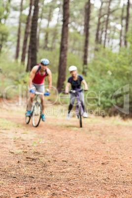 Pretty biker couple biking