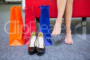 Woman with three shopping bags