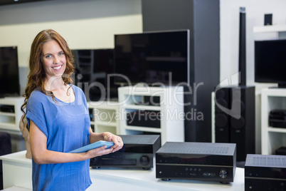 Pretty woman shopping for new electronics