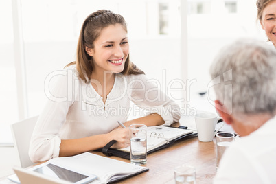 Smiling business people having a meeting