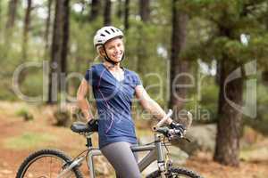 Pretty young biker looking at camera