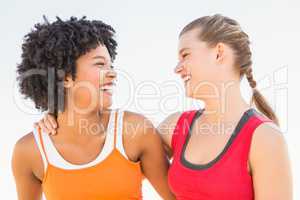 Two young women laughing