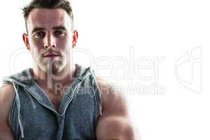 Handsome bodybuilder with arms crossed