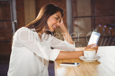 A beautiful businesswoman using a tablet