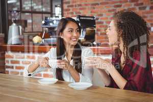 Female friends having coffee