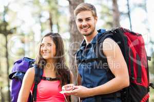 Young happy joggers looking at camera