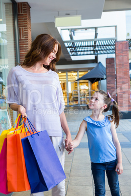 Mother and daughter shopping at the mall
