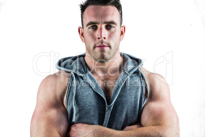 Handsome bodybuilder with arms crossed