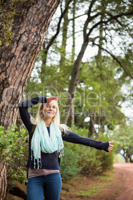 Pretty hitchhiker sticking thumb out