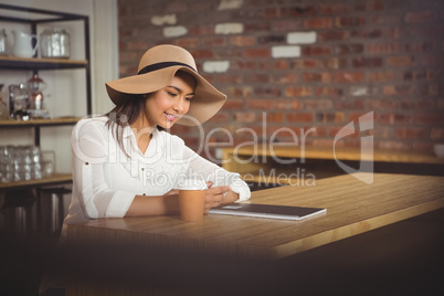 Beautiful businesswoman looking at a notebook