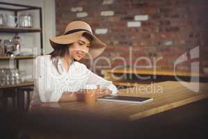 Beautiful businesswoman looking at a notebook