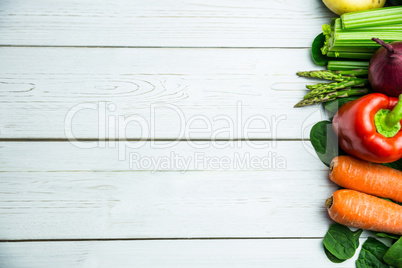 Line of vegetables on table