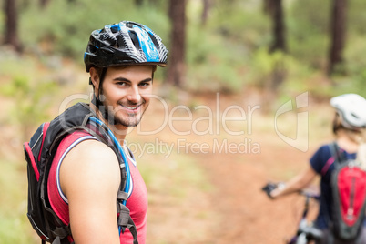 Handsome biker looking at the camera