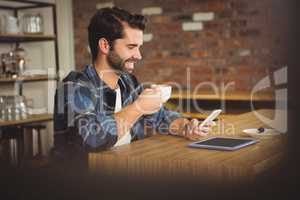 Young student using his smartphone