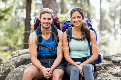 Young happy joggers looking at the camera