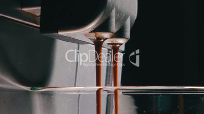 Coffee Machine Making Espresso into a Transparent Cap, closeup