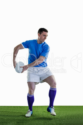 Rugby player doing a side pass