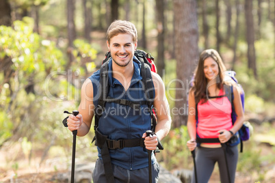 Young happy joggers looking at camera