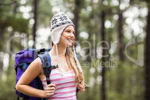 Young happy hiker looking in the distance