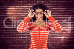 Smiling attractive woman posing with hipster glasses