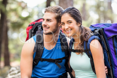 Young happy joggers looking at something in the distance