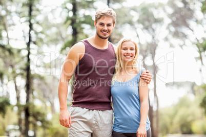 Young happy joggers looking at the camera